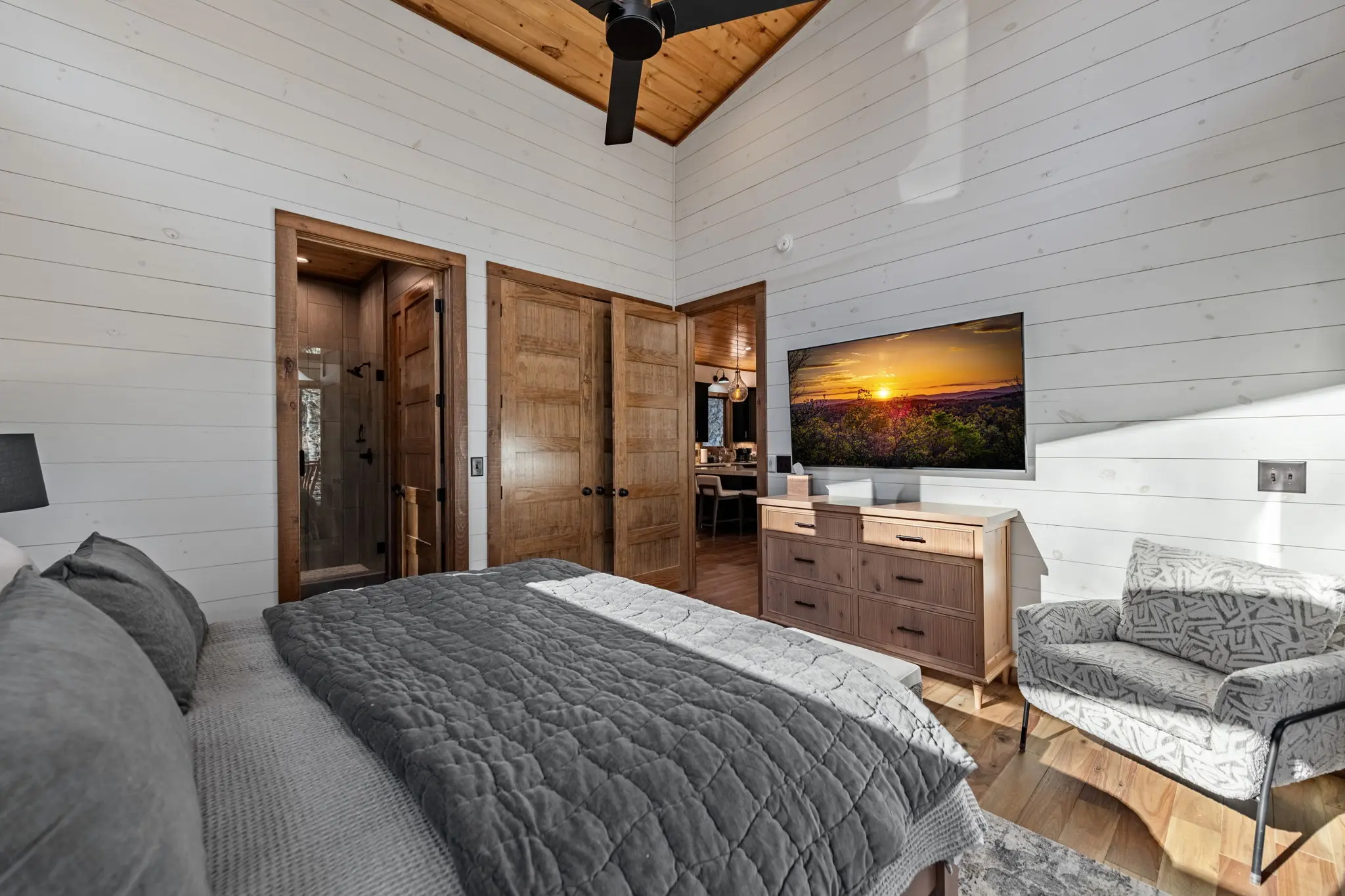 Secondary bedroom view toward the doorway and charming details.