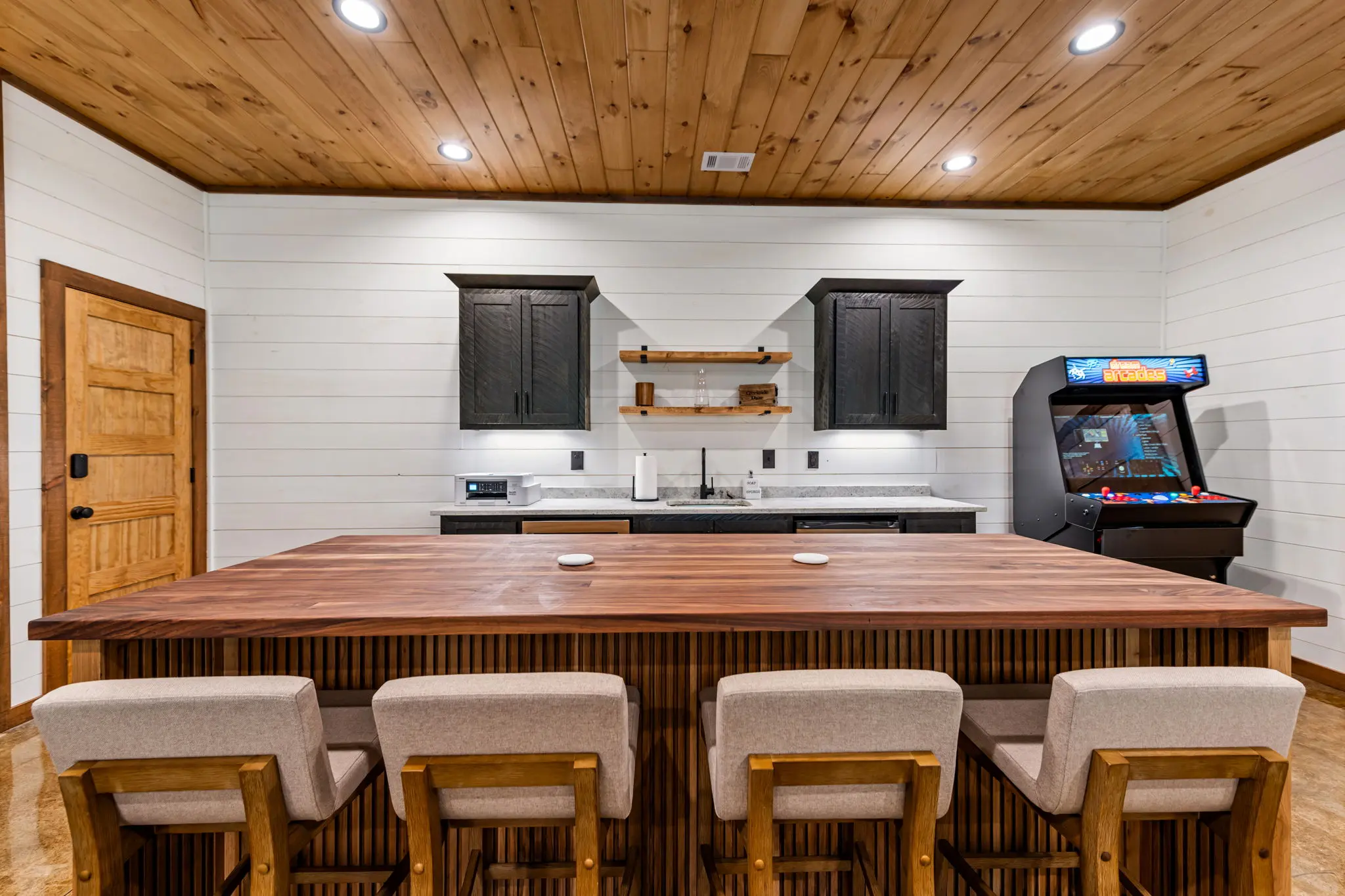 Kitchen bar seating overlooking the lower level living area.