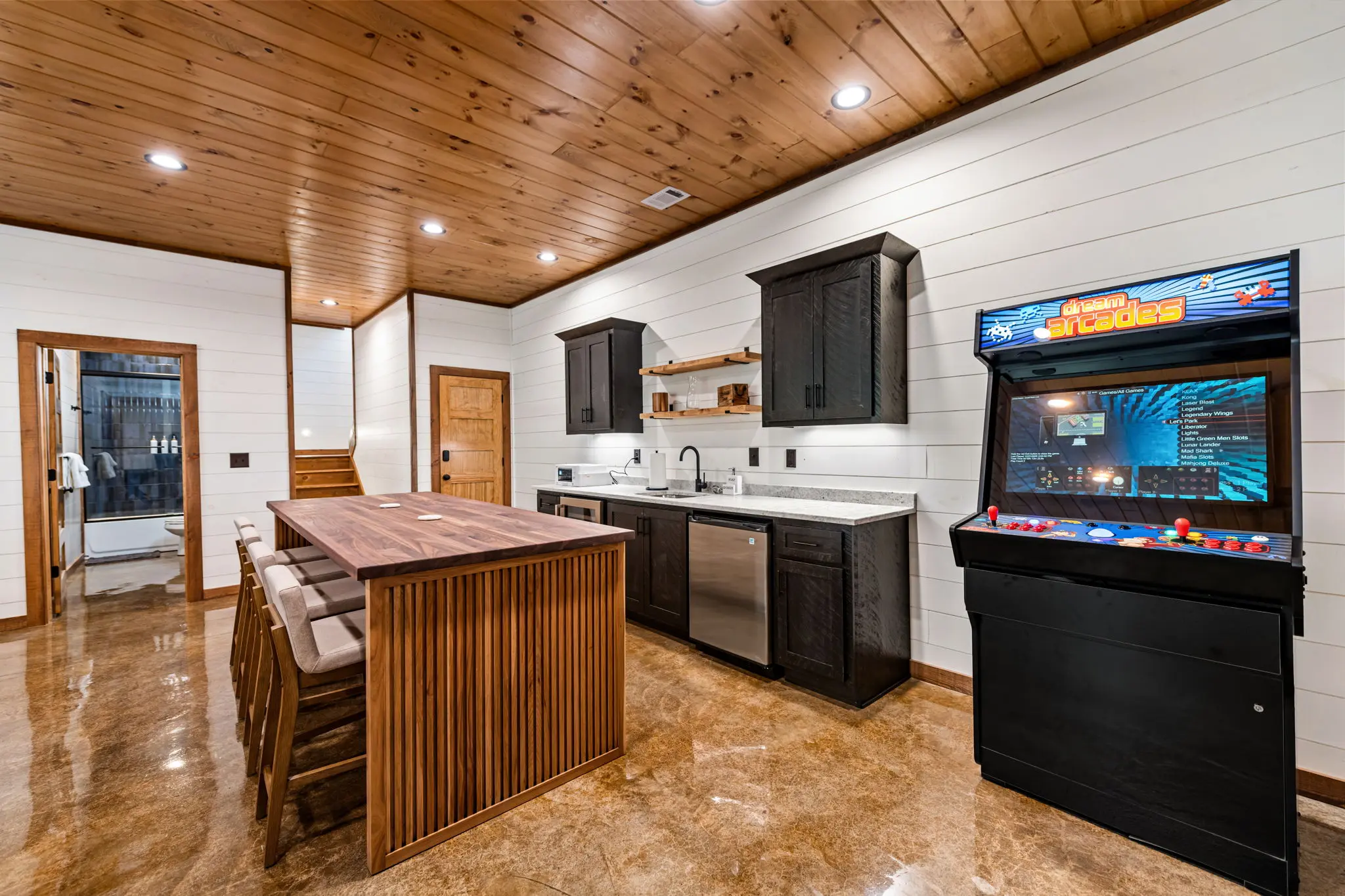 Entertainment area with multiple activity zones for family enjoyment.