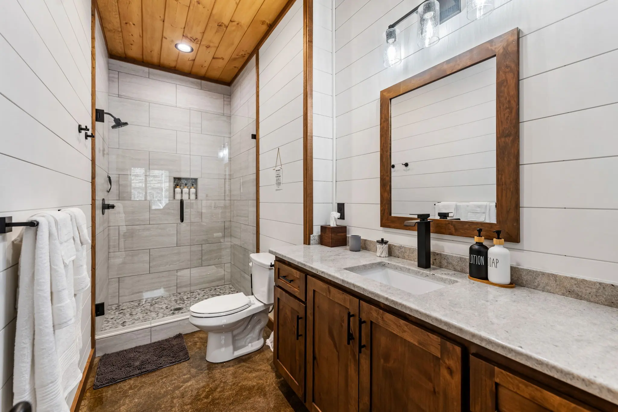 Primary bedroom ensuite bath with spa-like amenities.