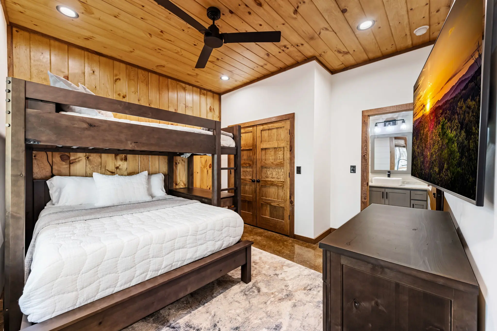 Secondary bedroom with cozy bunk bed arrangement.
