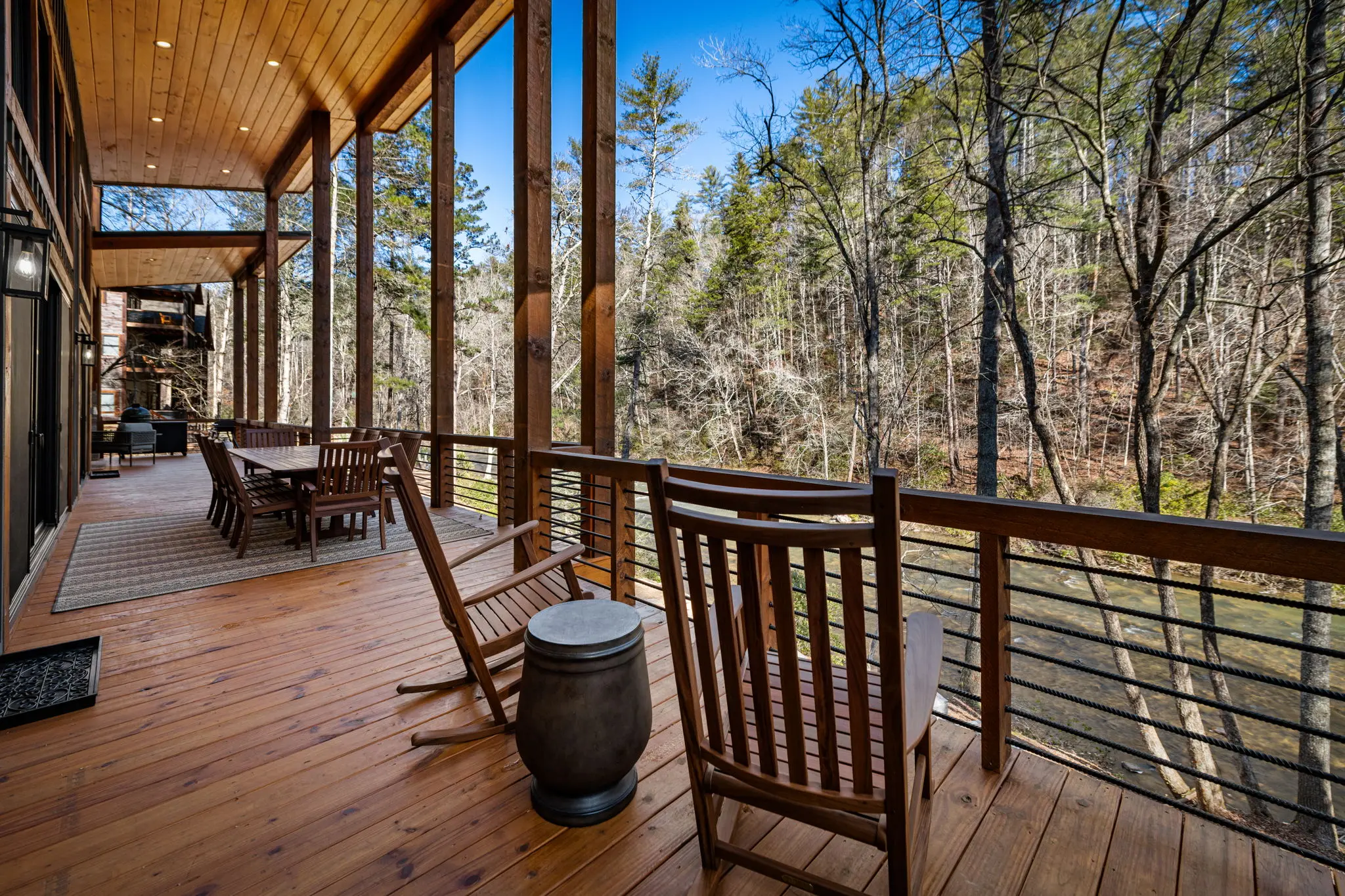 Upper balcony with a view within the tree canopy and the creek.